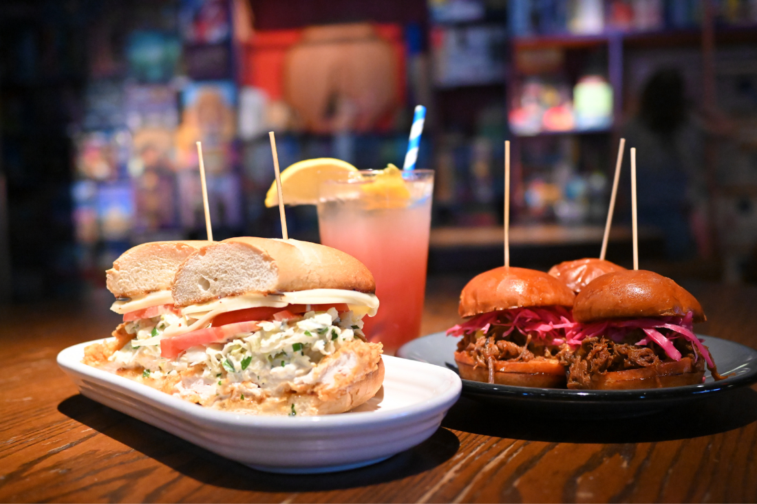 corner picture of brisket sliders and chicken sandwich